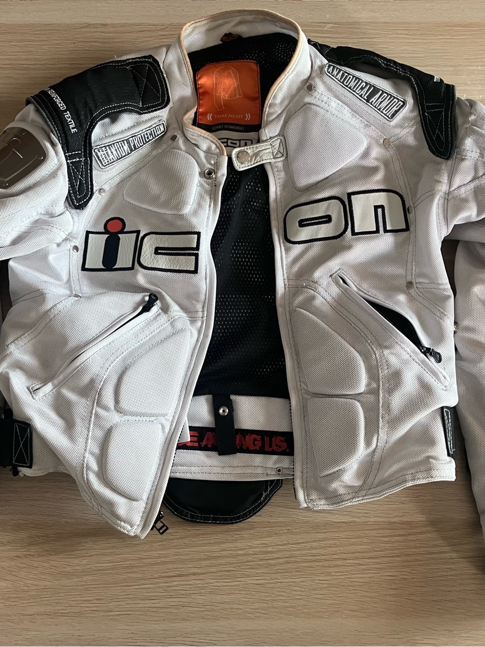 ICON White and Black Textile Motorcycle Jacket with Red Accent